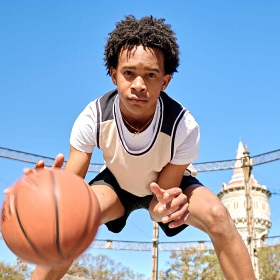 Student with a basket ball