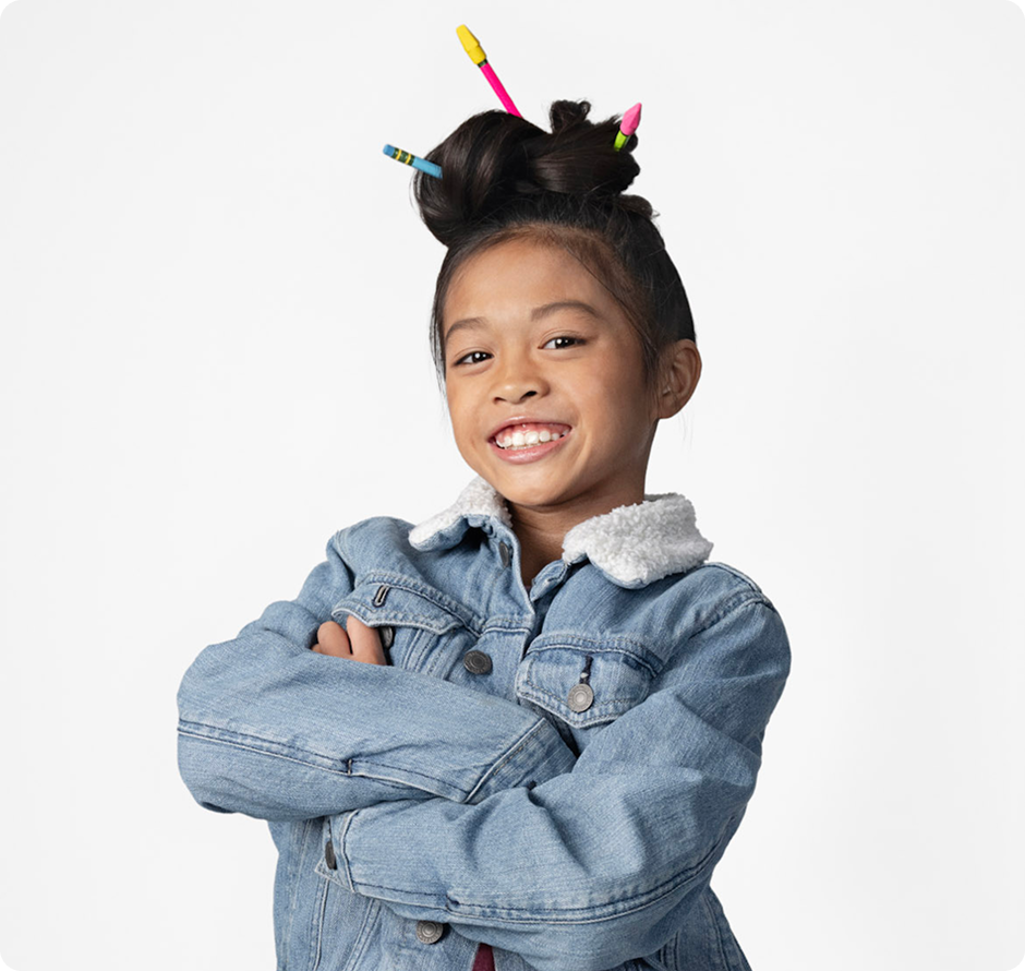 Student smiling at the camera